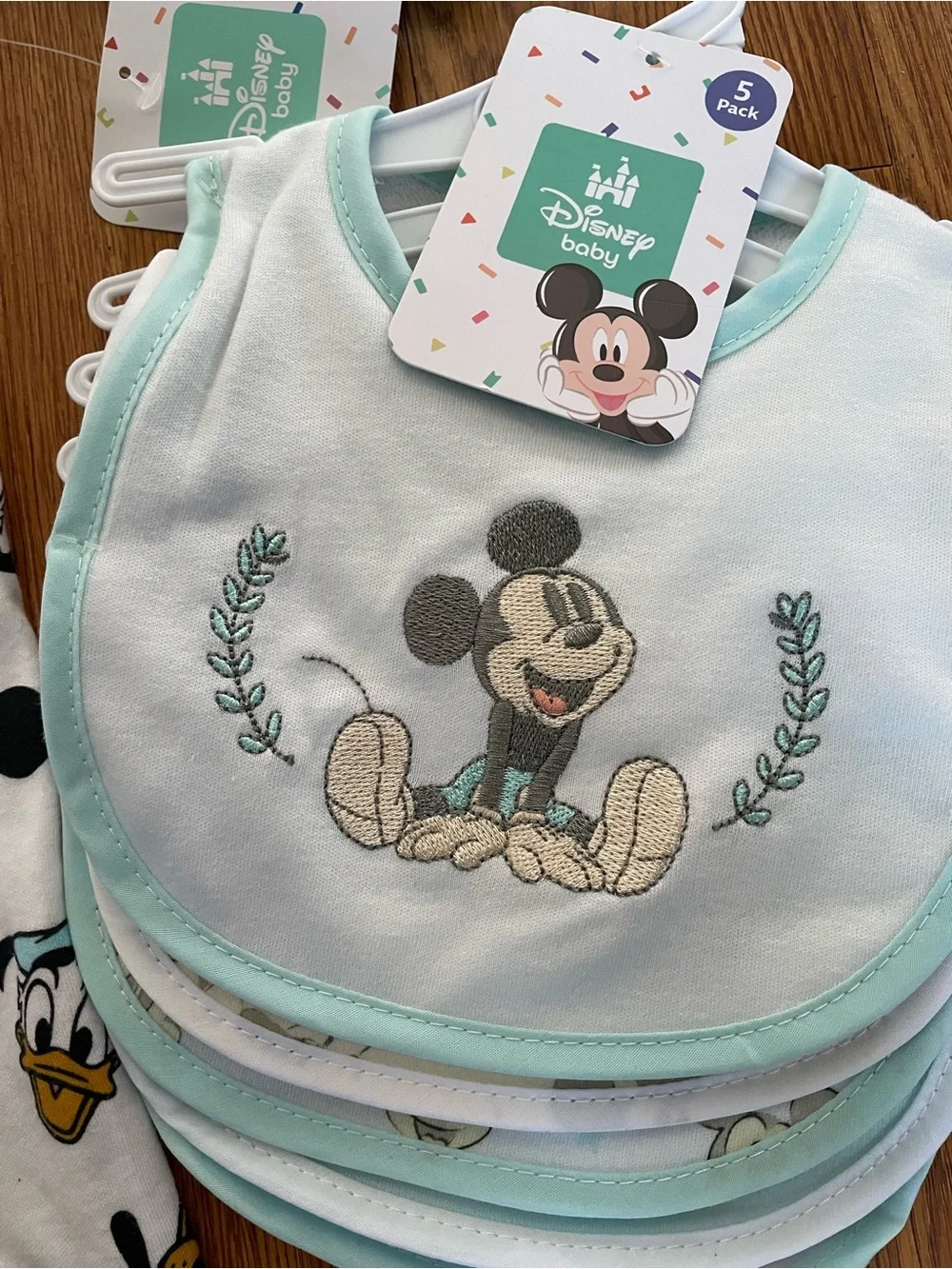 Disney baby footed sleeper and matching bibs